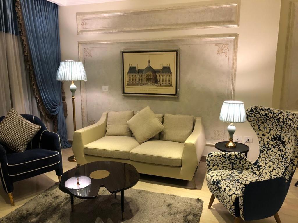 Fleet Club Mahrousa Alexandria Exterior photo A living room in a suite at the hotel