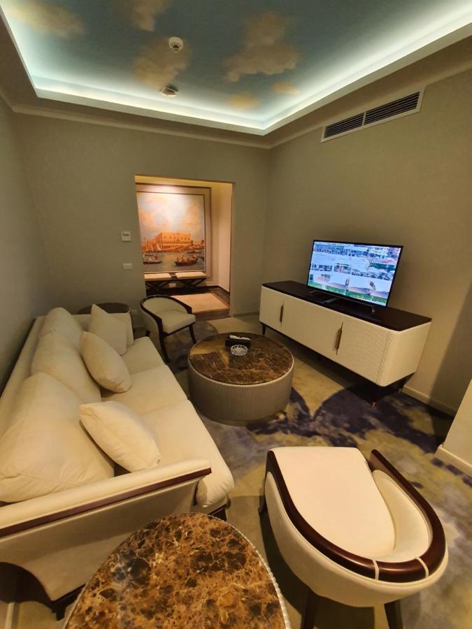Fleet Club Mahrousa Alexandria Exterior photo A living room in a suite at the hotel